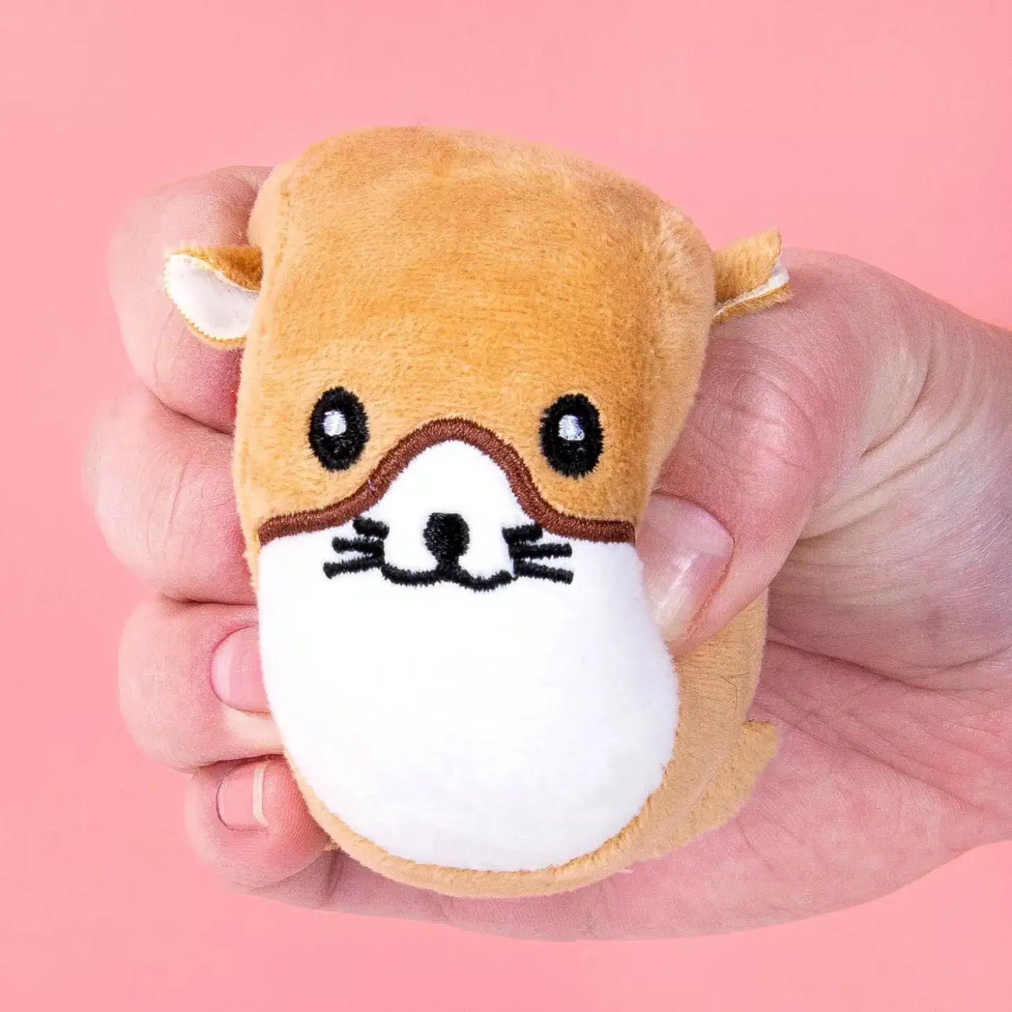Hamster stressbal en schermreiniger