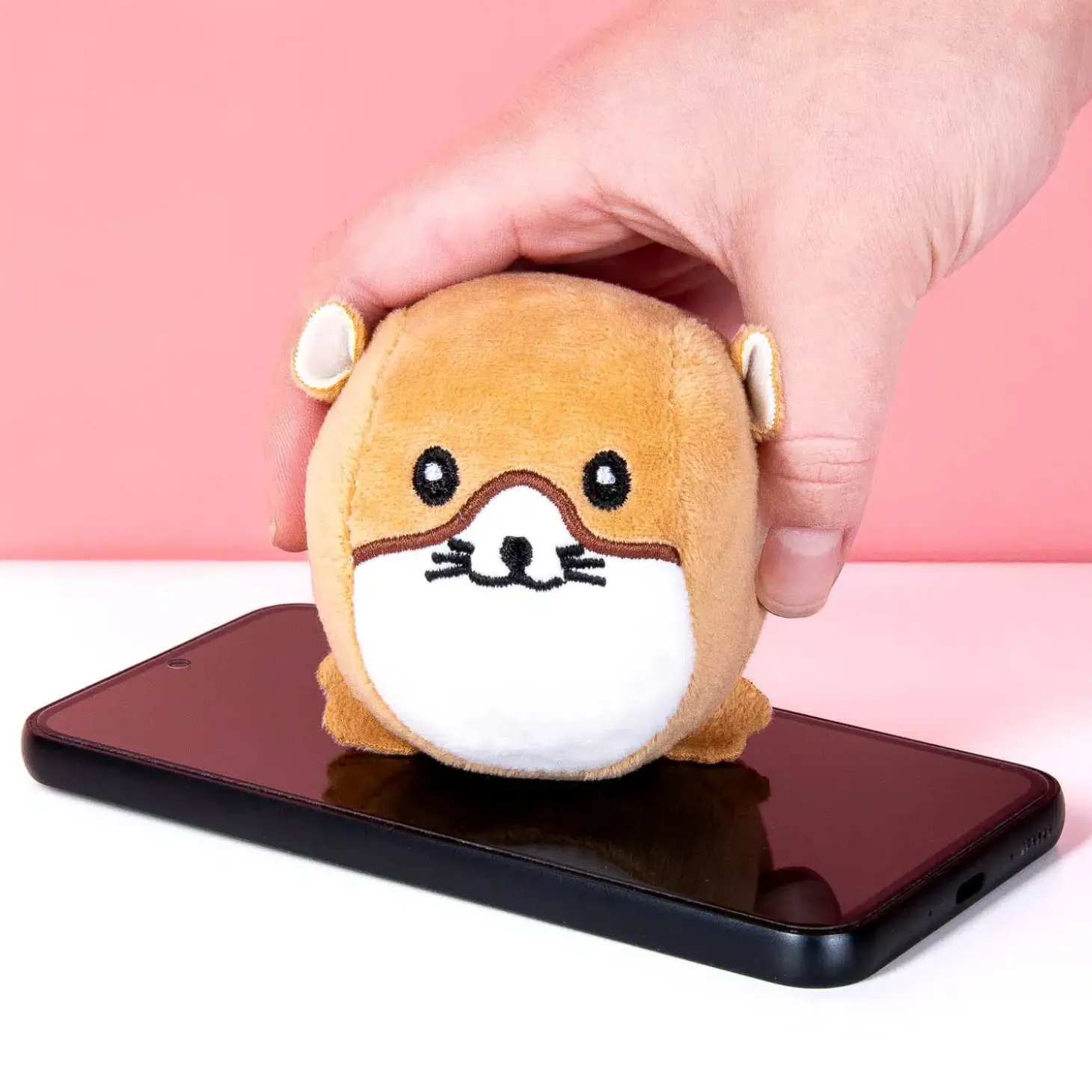 Hamster stressbal en schermreiniger