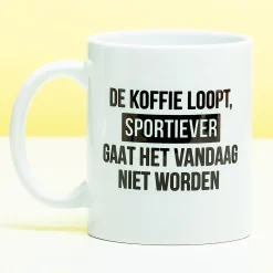 Mok De koffie loopt